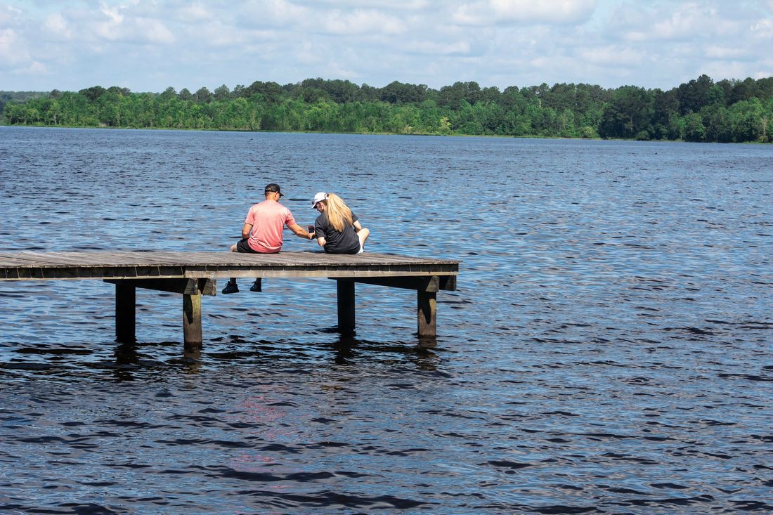 Family Fun at Little Black Creek Campground and Park with Couple Sitting 