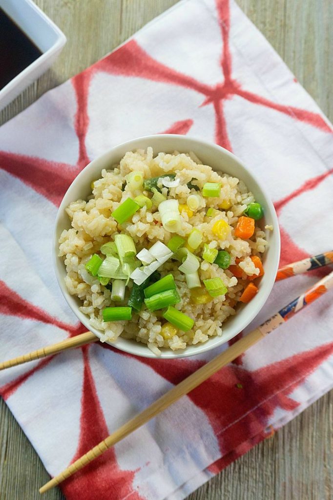 Easy Vegetable Fried Rice in bowl and chopsticks next to bowl