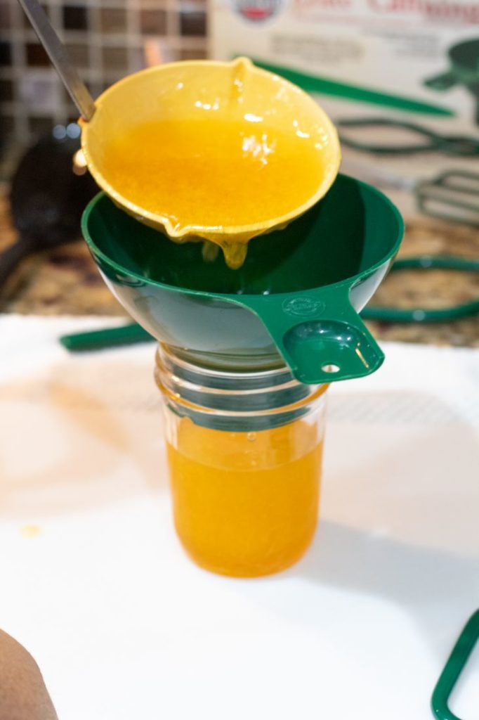 Picture of Satsuma Juice being put into jars with ladle