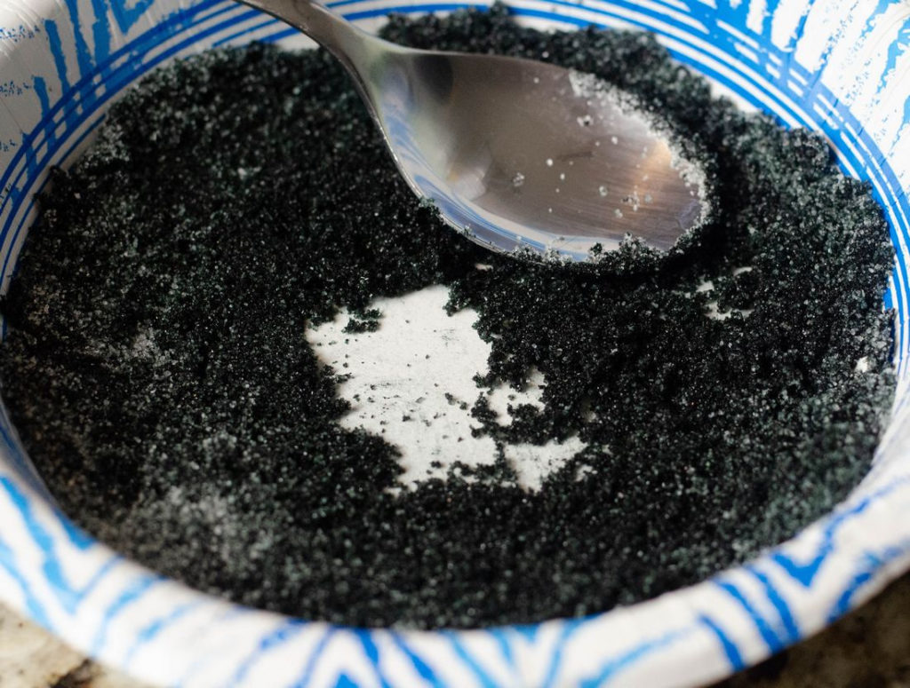 process photo of black sugar in bowl