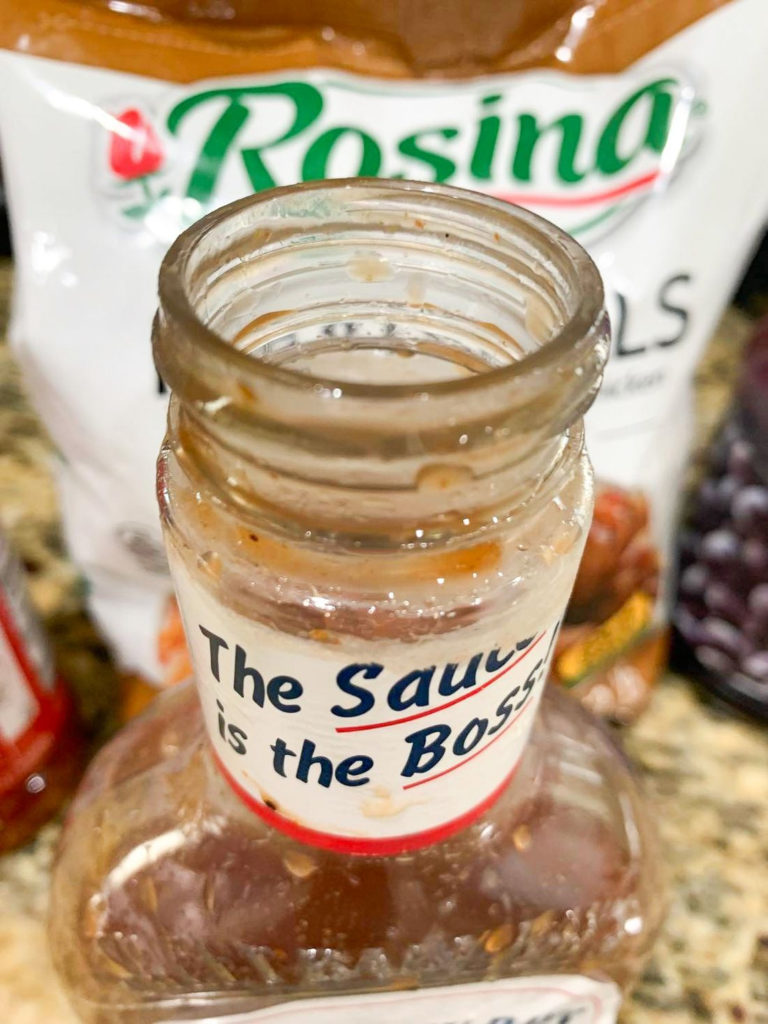Photo of barbecue sauce jar with water 